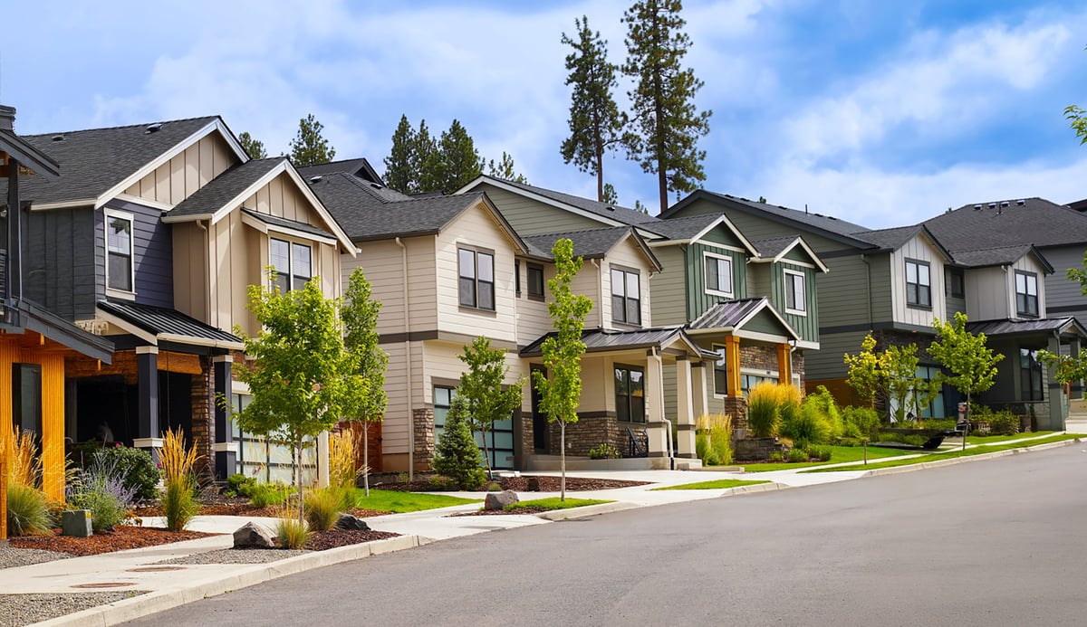A quiet Michigan neighbourhood under a clear blue sky